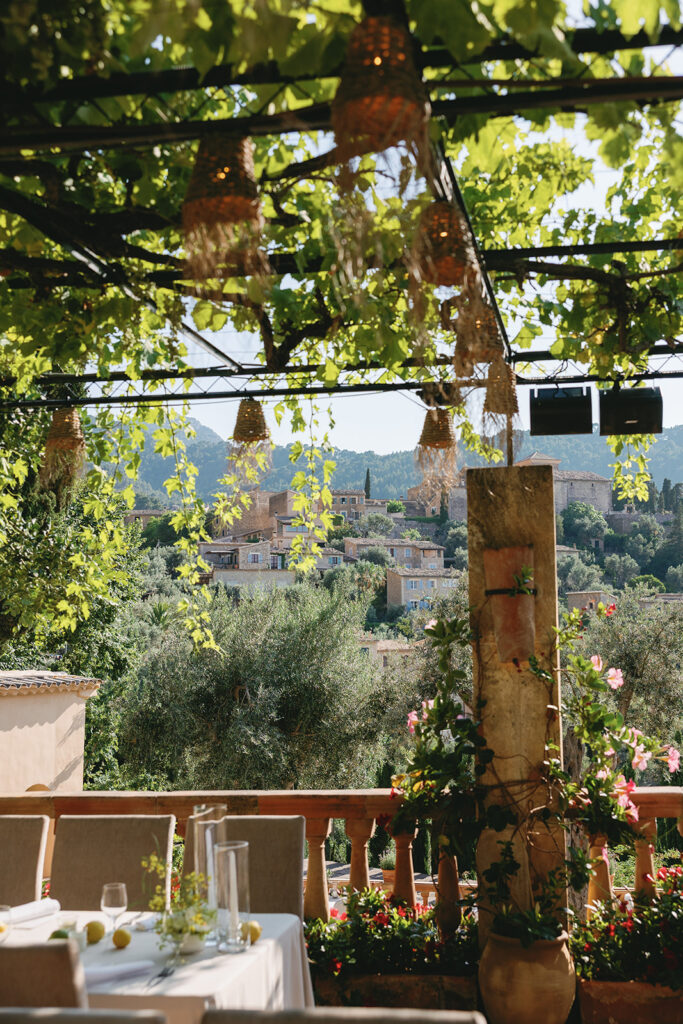 La Residencia wedding dinner — long table with lemons and greenery.